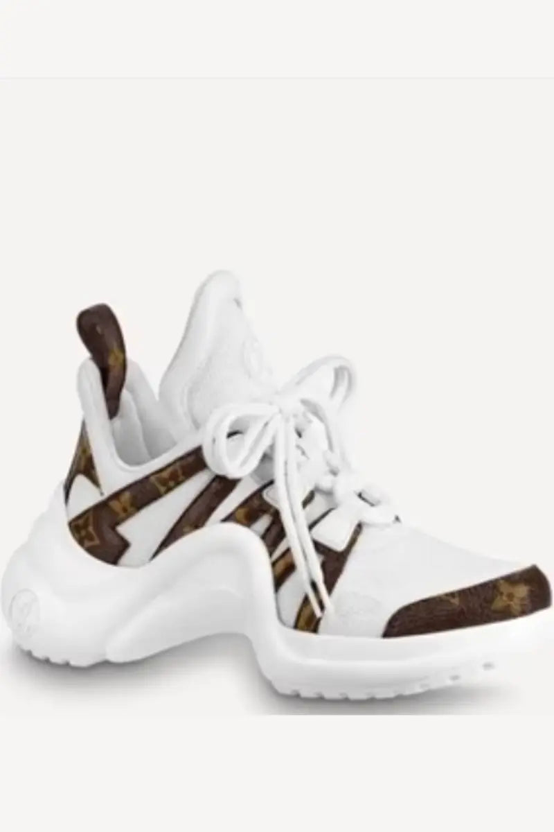 Taj V Logo Sneakers.   Runs small take a size up - Chic by Taj